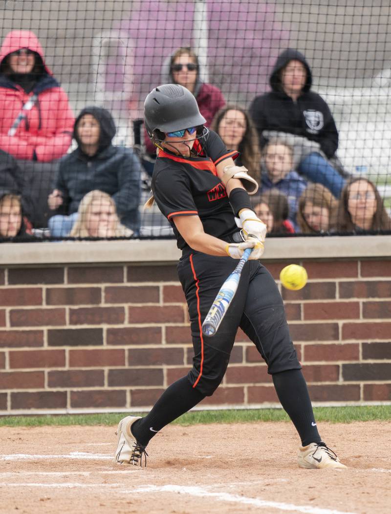 McHenry's Rylinn Gottstein connects with the ball during their game against Huntley on Wednesday, April 30, 2025 at Huntley High School. Ryan Rayburn for Shaw Local