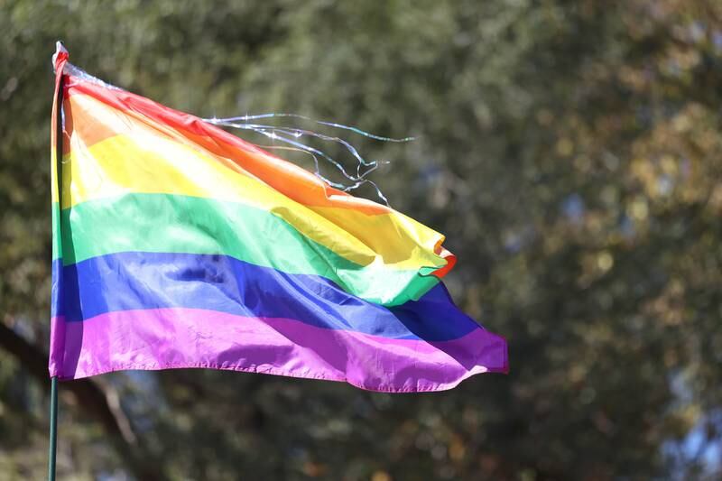 The Pride flag flies at Joliet's PrideFest on Saturday, Sept. 21, 2024 in Bicentennial Park.