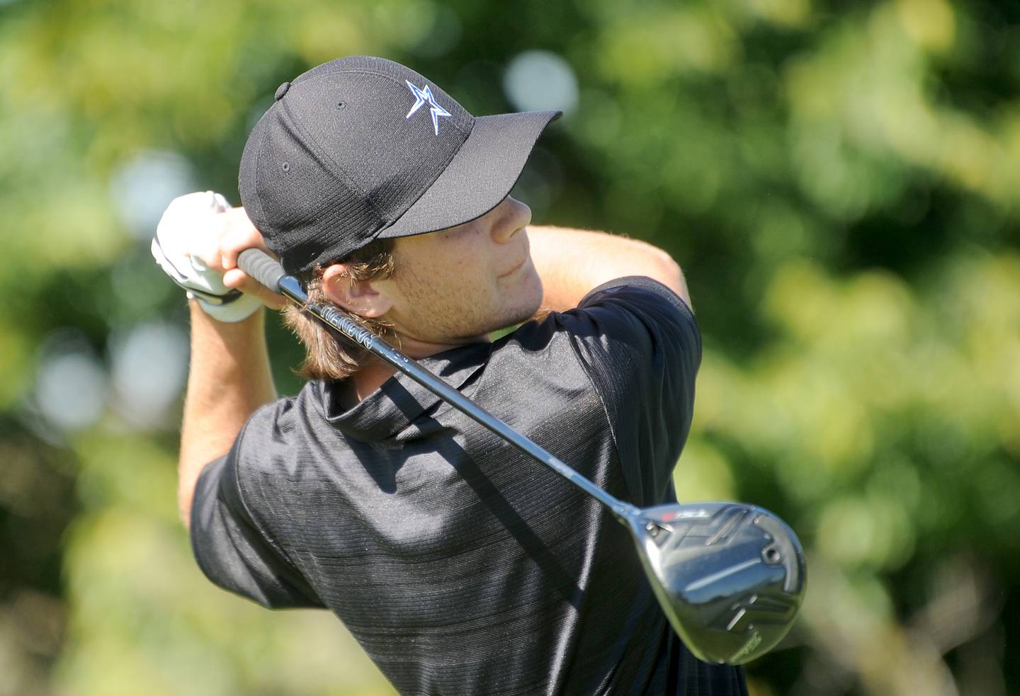 St. Charles North's Clay Heilman watches his tee shot on the 7th hole during the Class 3A Oswego Boys Golf Sectional at Blackberry Oaks Golf Course in Bristol on Monday, Oct. 3, 2022.