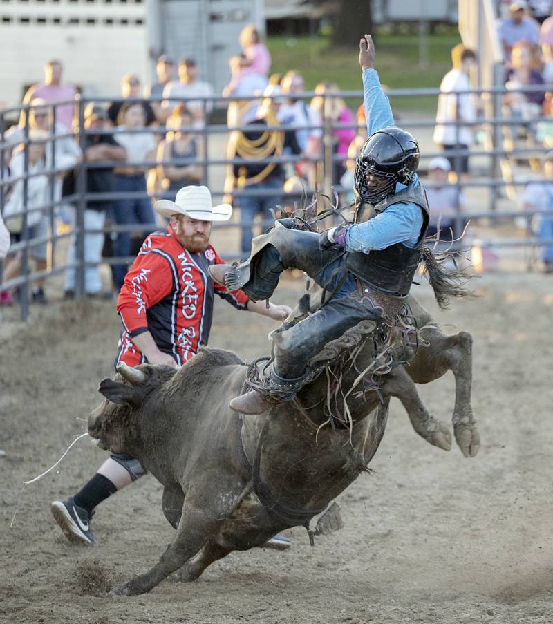 Keith Hall flies from his ride Tuesday, August 15, 2023 in the Next Level Pro Bull Riding event at the Whiteside County Fair.