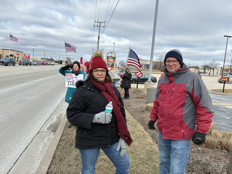 Mariela Ryan and her husband, Darrell Ryan, joined than 600 people out Sunday, Jan. 11, 2026, on Route 31 in McHenry for an anti-ICE protest, organized by Indivisible McHenry County. Mariela Ryan, a U.S. citizen from Venezuela, said her brother was detained by ICE in Florida two months ago although he is a legal U.S. resident.