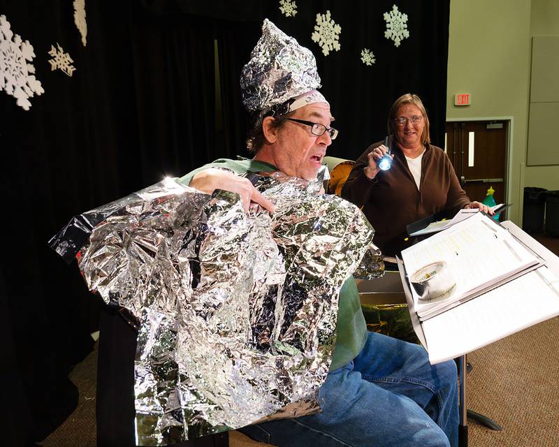 Larry Ubben and Trudy Whalen rehearse a scene for the Performing Arts Guild's "Christmas Eve in Chaos" to be presented Jan. 10-12 at the Allure of Pinecrest Grove Theater in Mt. Morris. For ticket information call 815-734-2103 or order online at performingartsguild.com.