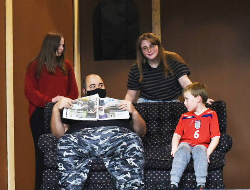 Mikkayla Hinkle,, center, as Grace Bradley, talks to her husband , Bob (Zach Arbogast) and her kids, Beth and Charlie (Christine Ayling and Kane Bitler) about being a part of the church's Christmas pageant.