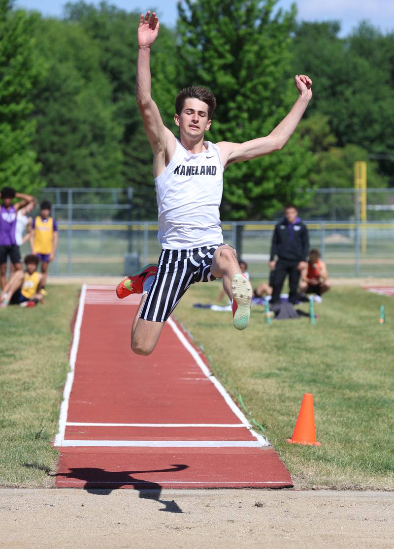 Kaneland’s Griffin Seaton takes his attempt at the long jump Wednesday, May 20, 2026, during the Class 2A boys track sectional at Rochelle High School.