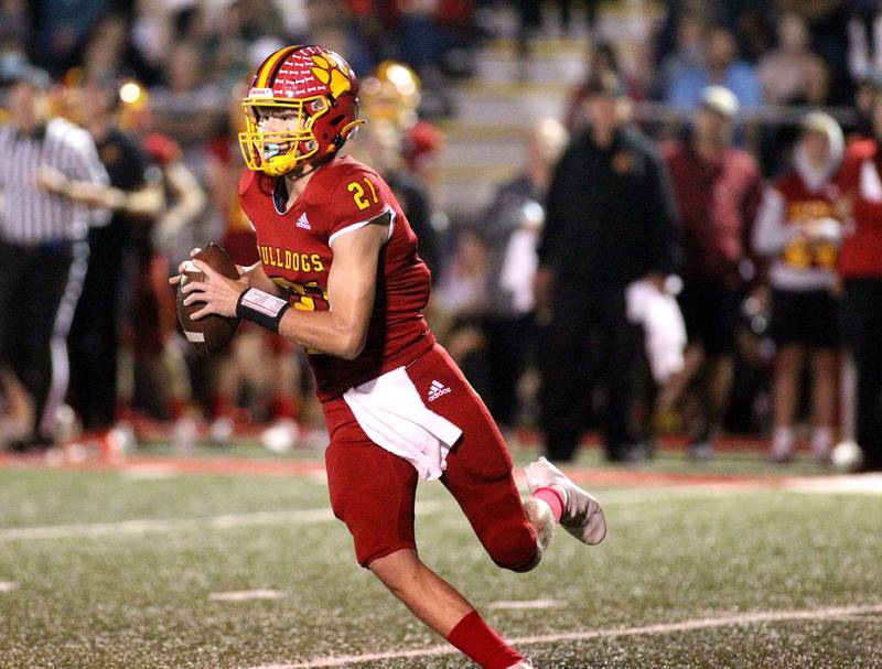 Batavia quarterback Ryan Boy looks to pass the ball during a home game against Glenbard North on Friday, Sept. 24, 2021.