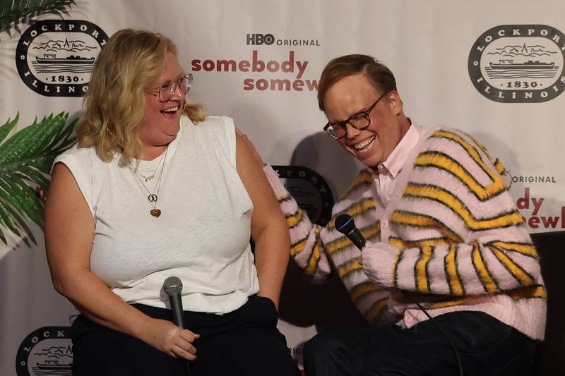 Actors Bridget Everett and Jeff Hiller have a laugh during a question and answer session at the HBO premiere of Somebody Somewhere at Roxy Lockport on Wednesday, Oct. 30, 2024 in Lockport.
