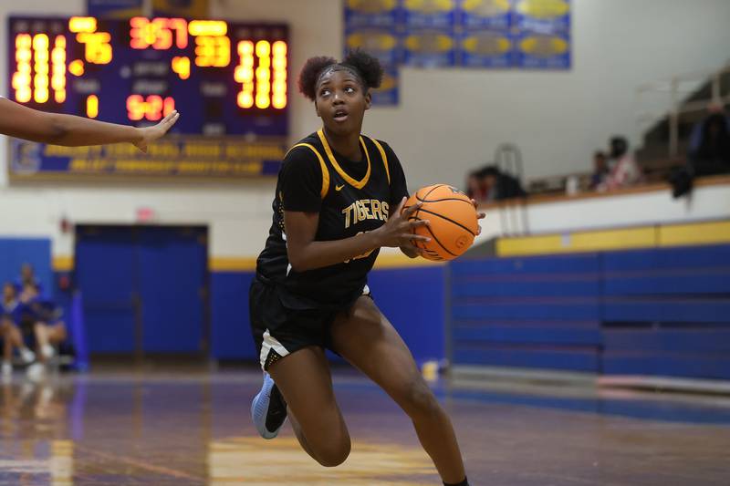 Joliet West’s Temperance Jackson looks to make a play against Joliet Central on Thursday, Jan. 15, 2026 in Joliet.