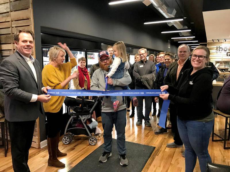 The Geneva Chamber of Commerce held a ribbon cutting for The Beer Cellar, located at 204 W. State St. in Geneva. Owner Dave Hawley cut the ribbon as Geneva Mayor Kevin Burns and Dave’s wife Lauren held the ribbon surrounded by family, friends, board members and city officials.