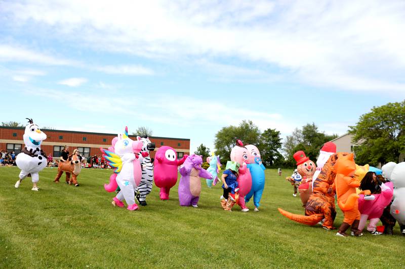 Teachers and staff members surprised students at Emily G Johns Elementary School in Plano with an inflatables race on Tuesday, May 27. 2025 after the all-school field day to celebrate the end of the school year.