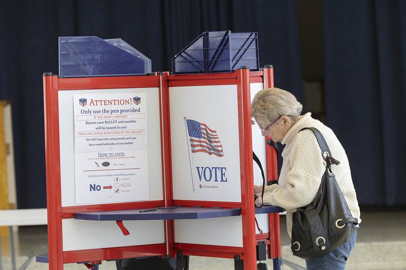 Lynette Masini makes her candidate choices Tuesday, March 19, 2024 at the Rock Falls Community Center for the spring primary.
