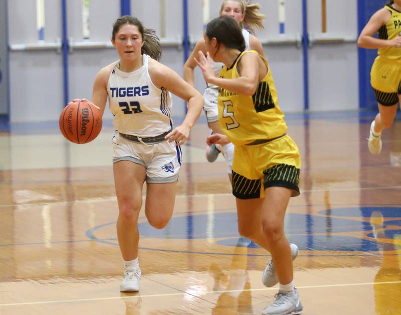 Princeton's Miyah Fox dribbles down the court while Putnam County's Eme Bouxsein defends during the Princeton High School Lady Tigers Holiday Tournament on Thursday, Nov. 16, 2023 at Prouty Gym.