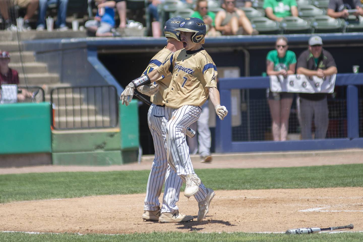 Ottawa-Marquette’s Gabe Almeda celebrates a Crusaders run against Brown County Friday, June 3, 2022 during the IHSA Class 1A baseball state semifinal.
