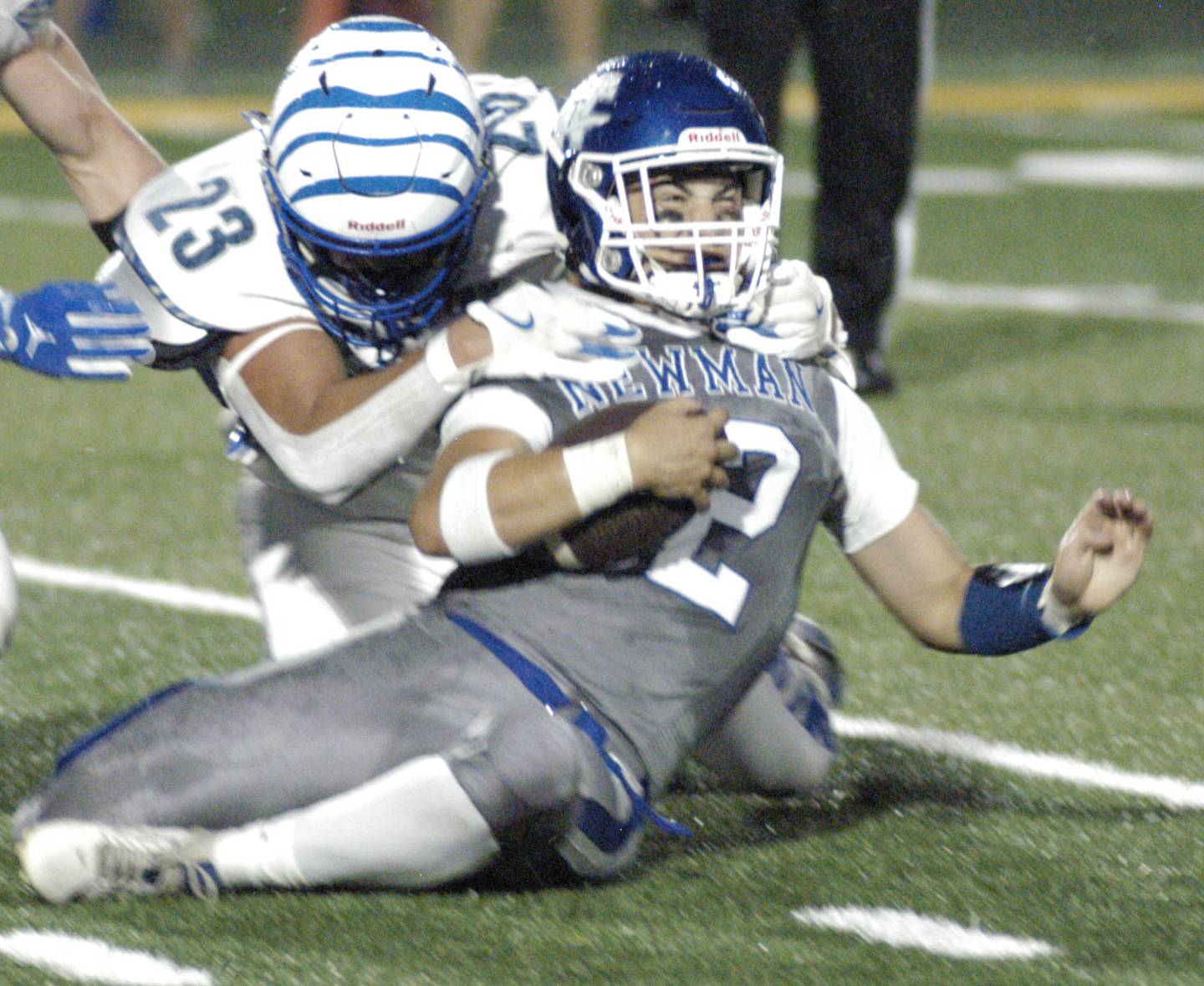 Newman's Evan Bushman is taken down by Princeton's Luke  Laporte. Newman Central Catholic H.S hosted Princeton H.S. in a non-conference football game at Sterling H.S, on Friday, August 29, 2025.