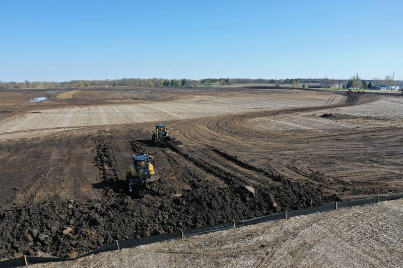 Excavators move dirt at the site of the future Ollie's Bargain Outlet warehouse distribution center on Tuesday, April 18, 2023 just to the north of the intersection of Illinois Route 26 and Progress Drive in Princeton. The 600,000 square-foot facility will be built on 130 acres and create more than 145 jobs. The project is expected to cost 68 million.