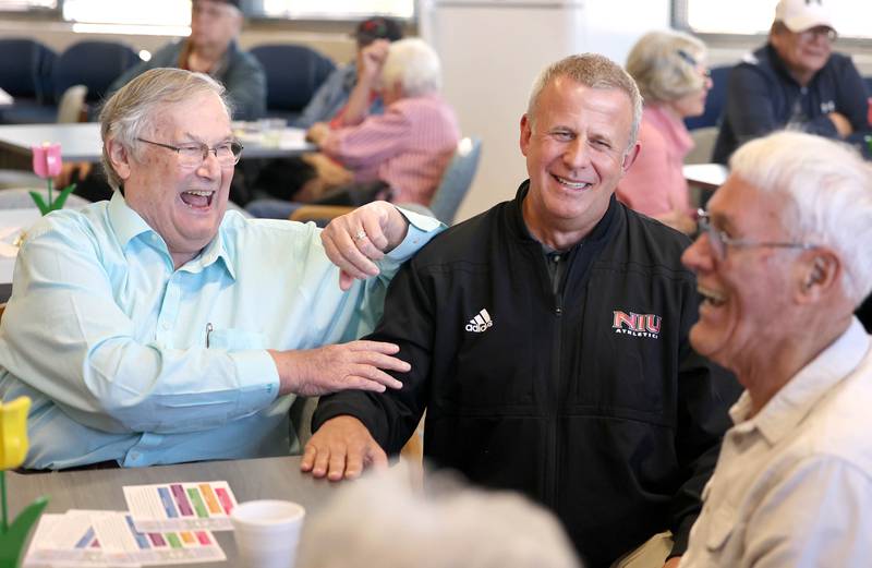 Former DeKalb Mayor Jerry Smith (left) and current Mayor Cohen Barnes (center) have a laugh with an attendee Monday, April 10, 2023, at the Family Service Agency’s Club 55 in DeKalb. The club was celebrating its grand reopening in its new location at Bethlehem Lutheran Church, 1915 North First Street in DeKalb.