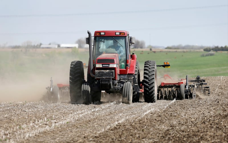 A farmer works in a field near De Soto in south-central Iowa.