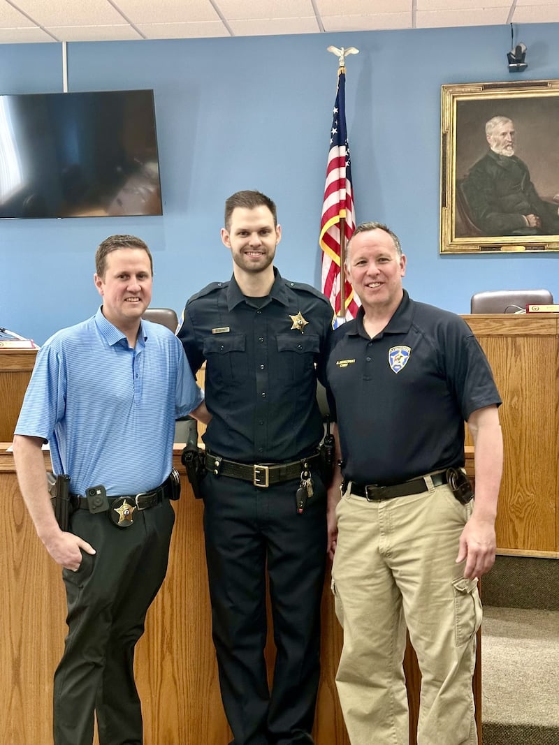 La Salle Police Detective Commander Martin, Officer Ray Gatza and Chief Mike Smidzinski after Gatza was sworn-in as a sergeant. Gatza was promoted to on Monday, April 28, 2025.