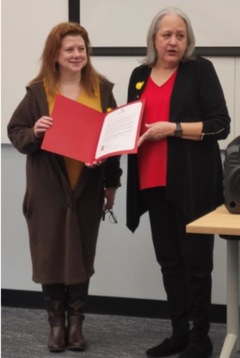 IVCC Professor of English and Women and Gender Studies, Dr. Kimberly Radek-Hall (left), serves as President of the LaSalle-Peru Area Club of Zonta International. Here, she is presented with recognition of the club’s 100th anniversary by ZI District 6 Governor, Isabel M. Vidal (Lincoln Club).
