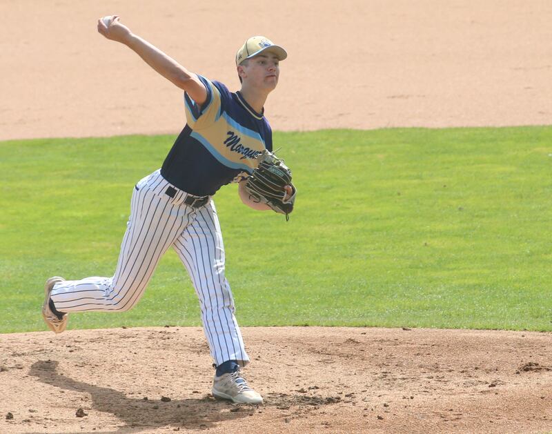 Marquette's Alec Novotney lets go of a pitch against Routt during the Class 1A semifinal game last season at Dozer Park in Peoria.
