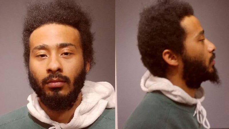 Plano man charged with striking a police officer after bar disturbance