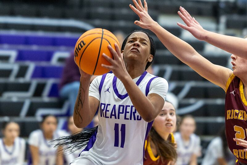 Plano's Jadyn Long goes up for a shot during Saturday's game with Richmond-Burton in Plano.