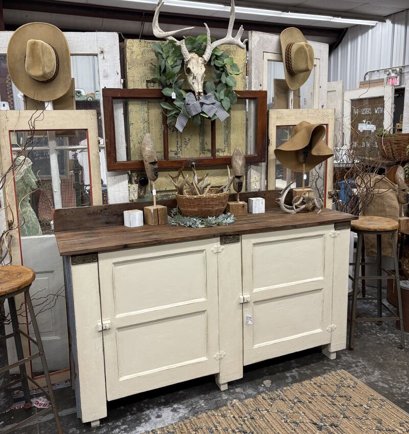 "Two Sisters with Junk in the Trunk" vintage items for sale in Marengo. The market is among hundreds in this weekend's 2026 Spring Vintage Shop Hop.