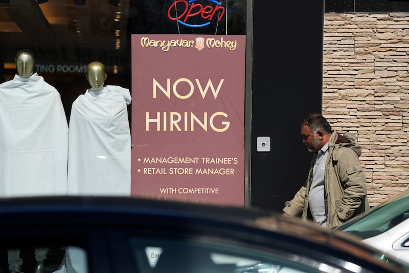 FILE - A hiring sign is displayed at a retail store in Chicago on Monday, March 11, 2024.  (AP Photo/Nam Y. Huh, File)
