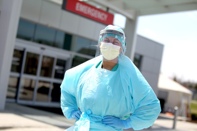Eryn Whiting is an emergency room nurse working with Covid-19 patients at Northwestern Medicine Delnor Hospital in Geneva.Linda Liddle, a Westmont trustee, has used her love for sewing to create masks and mask covers for local nurses, volunteers, front liners and area residents.
