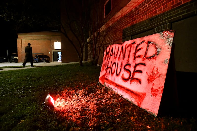 A volunteer in character walks the grounds of the Chebanse Civic Center during the Chebanse Haunted House's opening weekend in 2022.