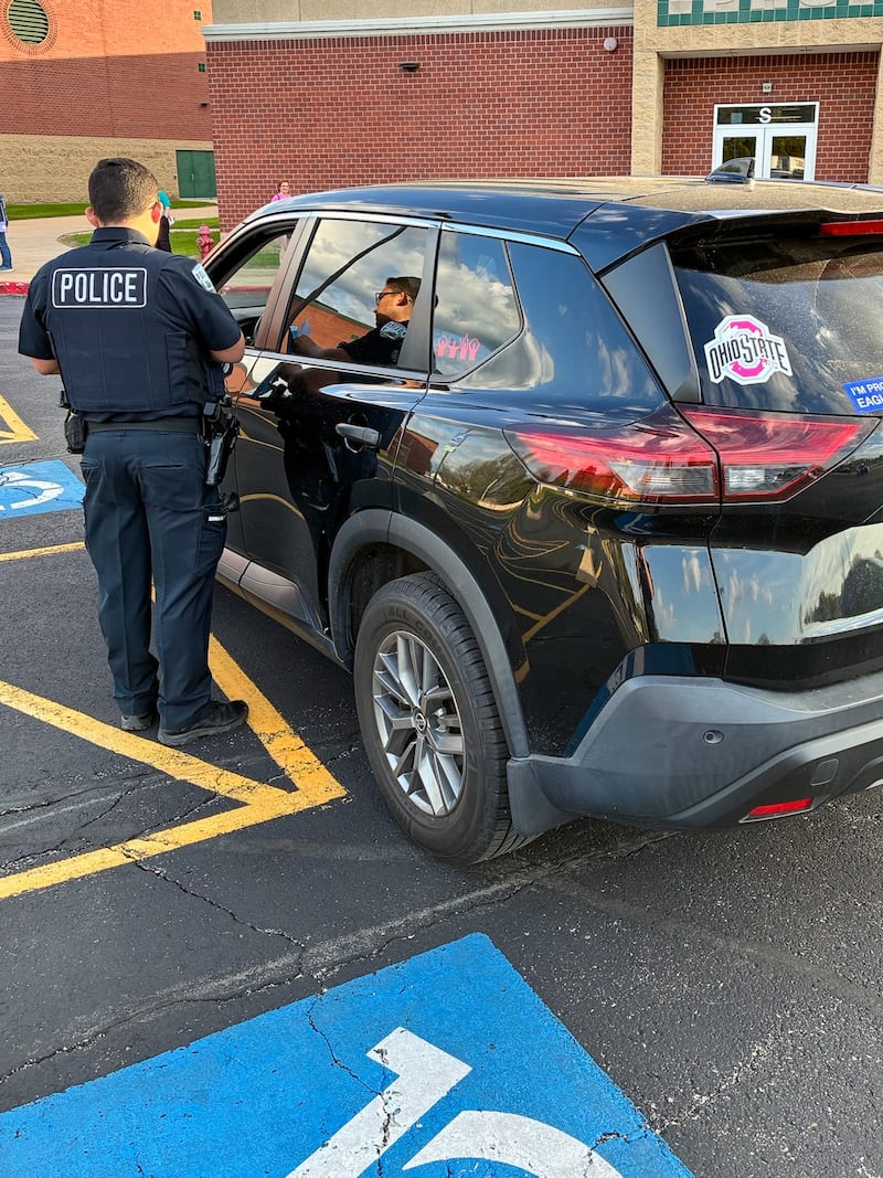 A Plainfield Police Department officer conducts a mock traffic stop on April 21 during an event at Plainfield High School-Central Campus. District 202 and the Plainfield Police Department hosted the mock traffic stop to teach neurodivergent drivers how to handle a traffic stop.