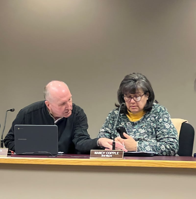Third Ward Alderpersons Marvin Barnes and Nancy Copple prepare for a Sycamore City Council meeting on Nov. 18, 2025.