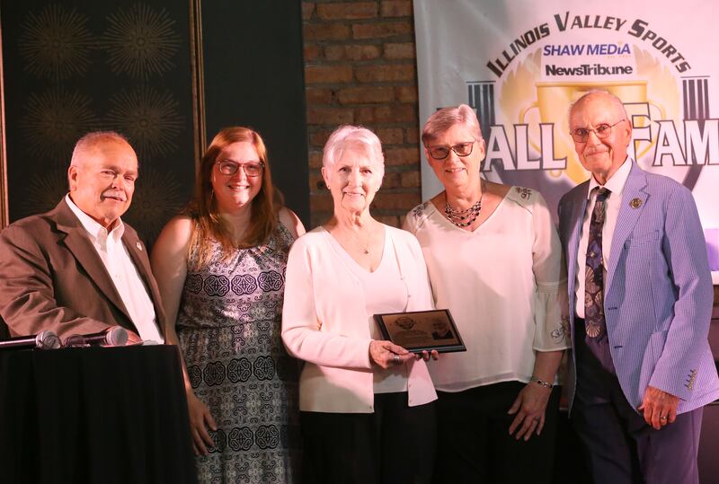 Ashley DePauw, Frances Scholle, and Mary Kibilka accept the Distinguished Media Award in honor of Shaw Media’s Charlie Ellerbrock during the 2025 Shaw Media Illinois Valley Sports Hall of Fame at the Auditorium Ballroom in La Salle. Ellerbrock spent 50 years as a sportswriter, including stints at the LaSalle News Tribune, Bureau County Republican and The Times in Ottawa.