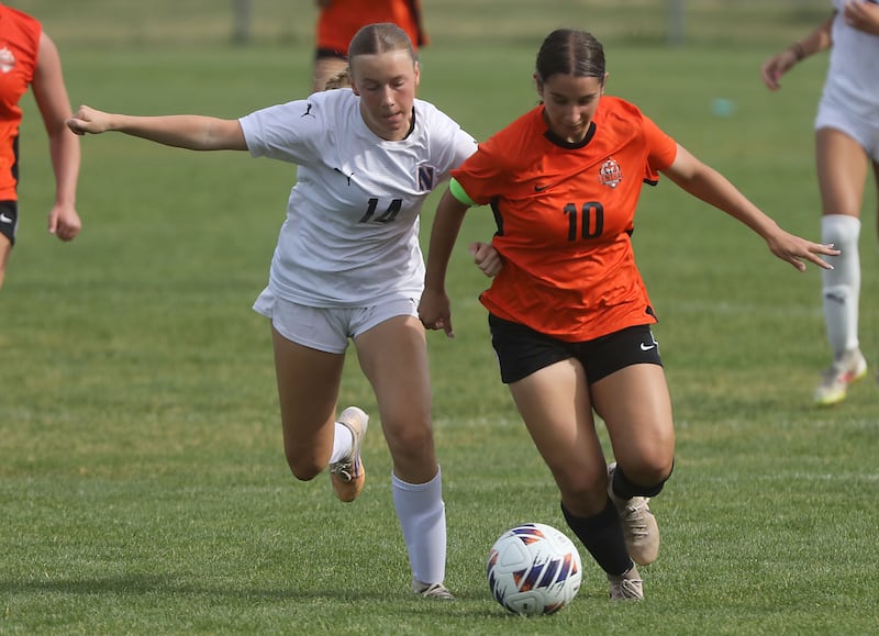 Crystal Lake Central's Addison Schaffer (right) out races Belvidere North's Madison Moore to the ball during the IHSA Class 2A Crystal Lake Central Sectional final girls soccer match on Friday, May 29, 2026, at Crystal Lake Central High School.