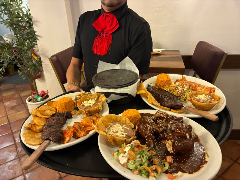 Food trays head out to the dining room at El Molino Mexican Restaurant  on Tuesday, Dec. 23, 2025. The Mexican restaurant at 2112 Elgin Road, Carpentersville, recently reopened with new owners and an updated interior.