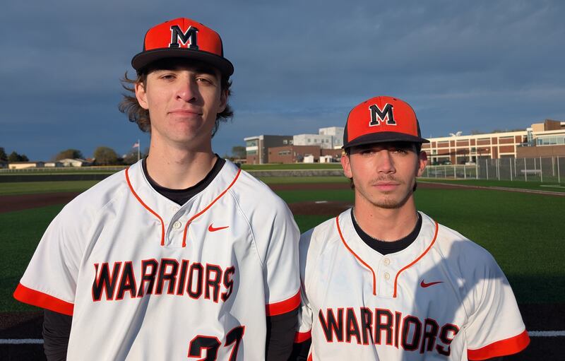 Bennet Baumann (left) and Nathan Neidhardt pose for a picture after they helped McHenry beat Jacobs 8-3 in a Fox Valley Conference baseball game Monday, April 20, 2026, in McHenry.