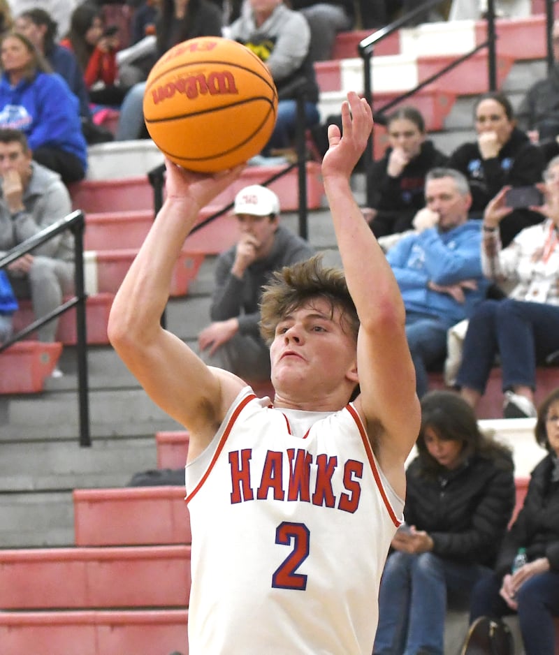 Oregon's Cooper Johnson shoots against Woodstock Marian at the Oregon Boys Basketball Thanksgiving Tournament on Wednesday, Nov. 26, 2025 at the Blackhawk Center in Oregon.