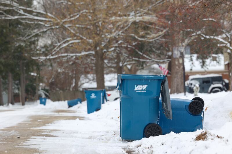 A Republic Services recycling bin sits empty in west Kankakee after pickup on Wednesday, Dec. 3, 2025. The city is seeking a new five-year contract for residential curbside garbage disposal services as the current contract ends Dec. 31. One of the two options available to bidders is ending the long-standing recycling program.