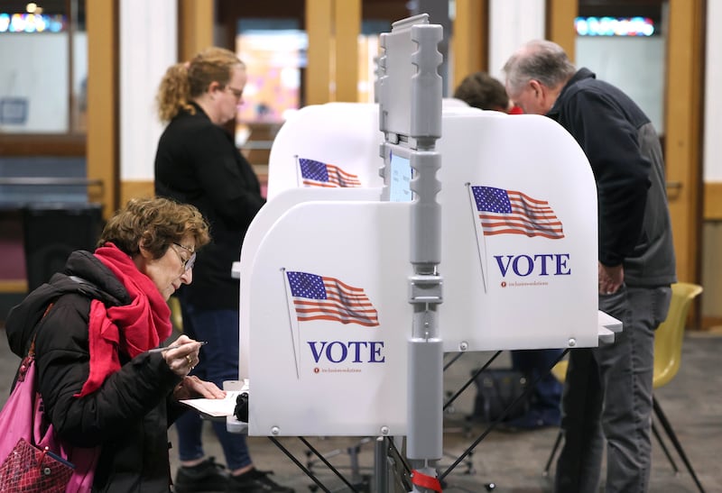 Voters cast their ballots Tuesday, April 1, 2025, in the polling place at the Westminster Presbyterian Church in DeKalb.