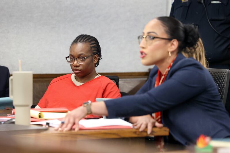 Defense attorney Cierra Norris makes a statement during court proceedings for Xandria Harris, left, in Judge Kathy Bradshaw-Elliott's courtroom on Friday, Aug. 8, 2025