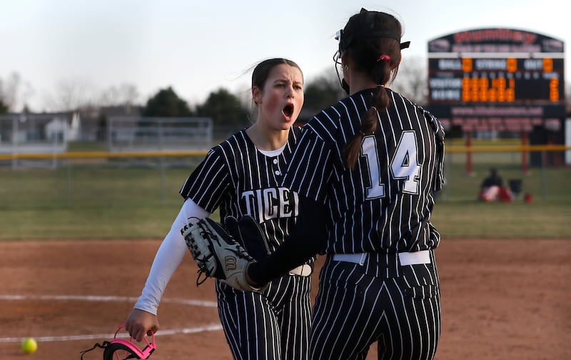 Crystal Lake Central's Oli Victorine greats here teammate, Lily Perocho, Perocho made a catch to end the inning during Fox Valley Conference softball game against Huntley on Tuesday, April 8, 2025, at Huntley High School.