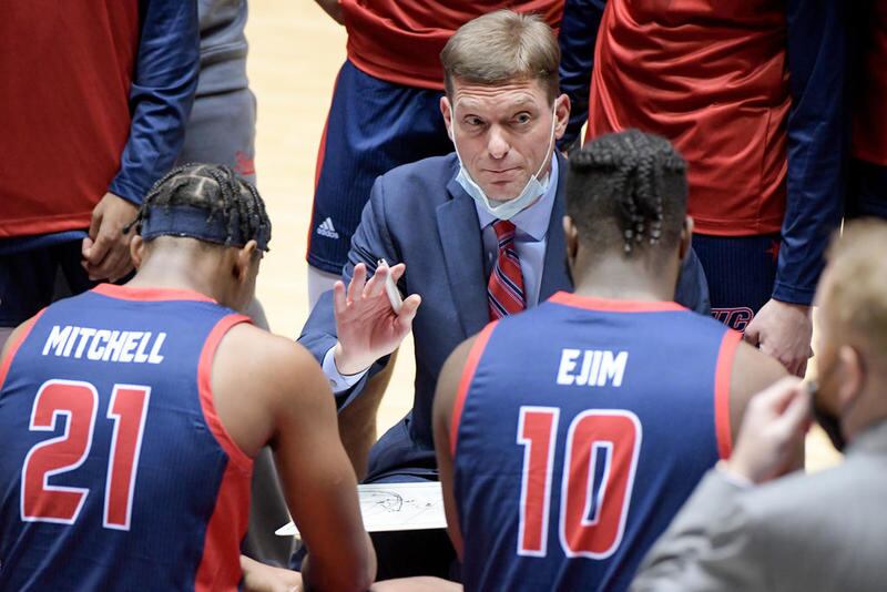 Illinois-Chicago head coach Luke Yaklich coaches during a Flames victory over Northern Illinois. On Friday, Lincoln-Way East announced the hiring of Yaklich to lead the Griffins program.