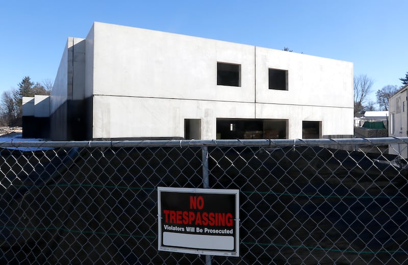 A partially constructed five-story, 100-unit apartment complex at 401 Algonquin Road near Route 14 in Fox River Grove on Tuesday, March 16, 2023. Contractors allege in court records that they haven't been paid for work on the building, which had drawn the ire of neighbors and concerns from the Fox River Grove Fire Protection District.