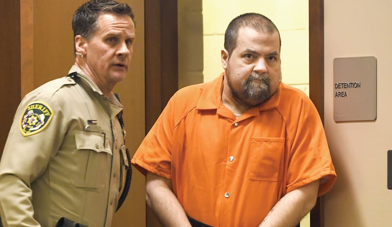 Derek Swanlund is escorted into an Ogle County courtroom by Deputy Dan Daub for a pretrial status hearing on Wednesday, Dec. 10, 2025. He is charged with killing his stepson, Cameron Pasley, in April in a Mt. Morris apartment.