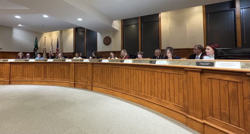 Students from Shepherd Middle School and Marquette Academy fill the seats of Ottawa city officials during the Kiwanis Kids Club’s annual mock City Council meeting Tuesday night at City Hall.