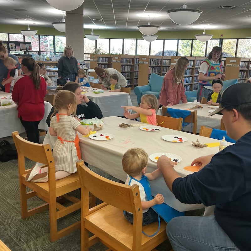 Last week, at Julia Hull District Library, toddlers gobbled-up some messy fun as they used their hands and fingers to create Thanksgiving themed works of art.