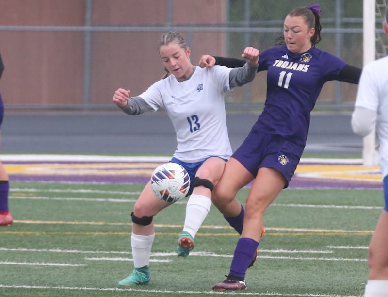 Mendota's Ella Cross beats Princeton's Chloe Ostrowski to a header during the Class 1A Regional final game on Tuesday, May 20, 2025 at Mendota High School.