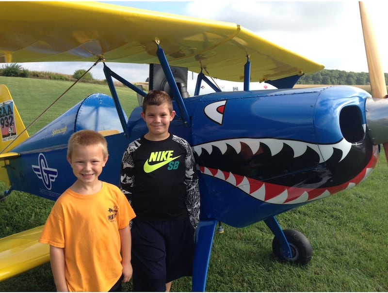 Evan Bate, 8, and his brother Erik Bate, 10, Sept. 17, 2016, at "Planes & Puppies Young Eagles Rally" at Galt Airport near Wonder Lake, the first time the brothers flew in a single engine airplane and the day Evan Bate learned he wanted to be an airplane pilot when he grew up.