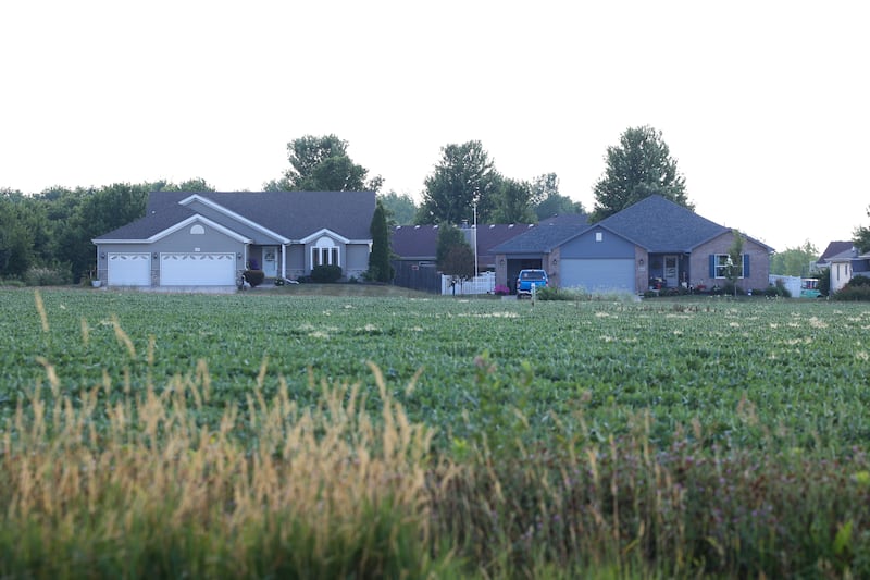 A subdivision sits adjacent to a field for sale in Bourbonnais on July 9, 2025. A recent housing study commissioned by the Economic Alliance of Kanakee County found the county needs to annually construct 500-600 housing units to meet the need, but it is not.