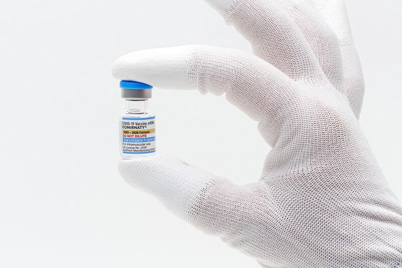This photo provided by Pfizer in August 2025 shows a vial of the updated COVID-19 vaccine Comirnaty. (Pfizer via AP)
