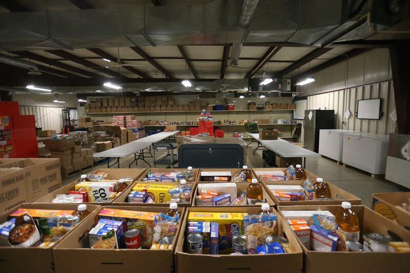Boxes of food fill the floor on Tuesday, Oct. 28, 2025 at the Illinios Valley Food Pantry in Peru. Food assistance used by more than 40 million Americans will not be distributed from November due to the ongoing US government shutdown. Food shortage will worsen local food pantries due to the the shutdown.